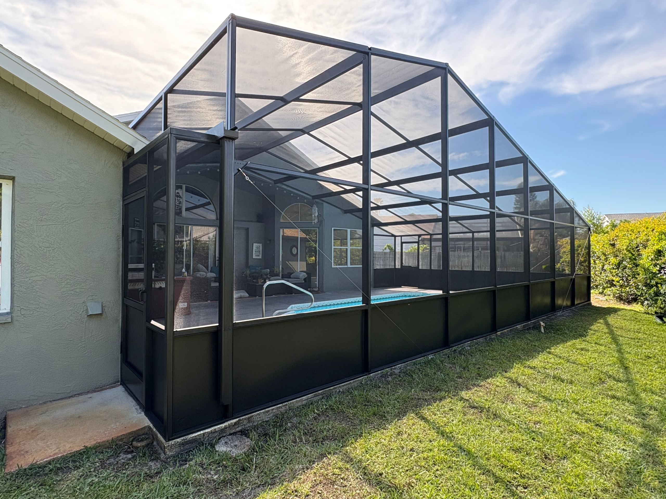 After: freshly painted pool cage and lanai in Safety Harbor Pinellas County Florida